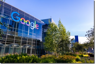 June 8, 2019 Mountain View / CA / USA - Google office building in the Company's campus in Silicon Valley; The "double o's" of the logo are decorated in rainbow colors in honor of LGBTQ Rights  