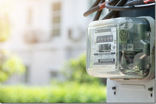 Electricity meter on a light pole. Energy and economic concepts.