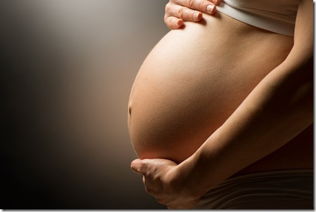 Pregnant woman belly. Pregnancy concept